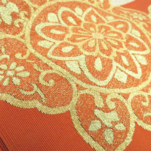 名古屋帯 本つづれ帯 朱地 金糸 華文紋様 お太鼓柄 正絹 桐箱入 つづれ