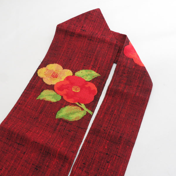 名古屋帯 正絹 紬 朱色x黒色x黄色 椿模様 お太鼓柄 カジュアル