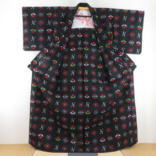 Load image into Gallery viewer, ウール着物 単衣 井桁に花文様 絣柄 織り柄 黒色 バチ衿 カジュアルきもの 普段着物 仕立て上がり 身丈166cm