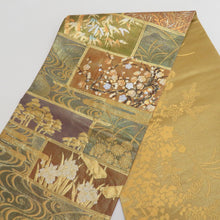 Load image into Gallery viewer, Vehicle band Seasonal flower crest Gold with foil x olive green x brown gold thread silver thread with lame pure silk -tailed kimono length 440cm