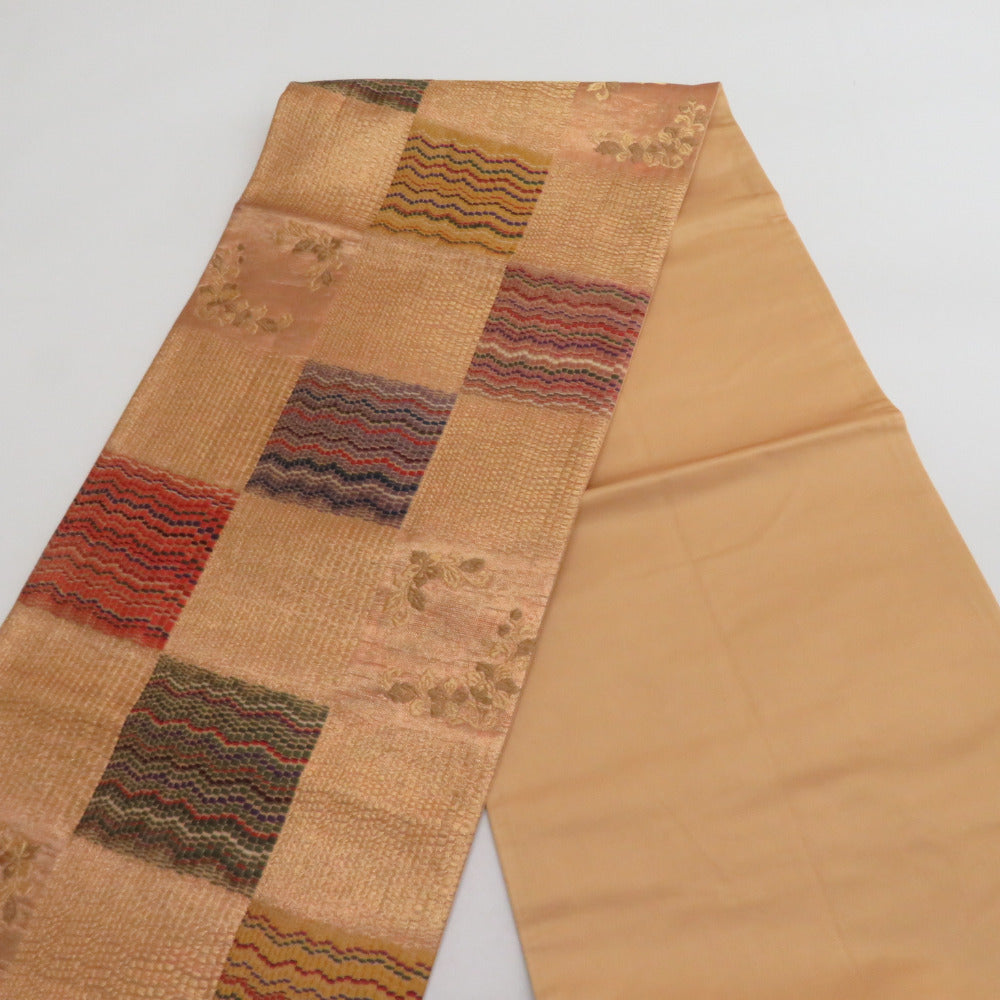 袋帯 正絹 流水に華文 薄オレンジ色x金色 金糸 六通柄 フォーマル