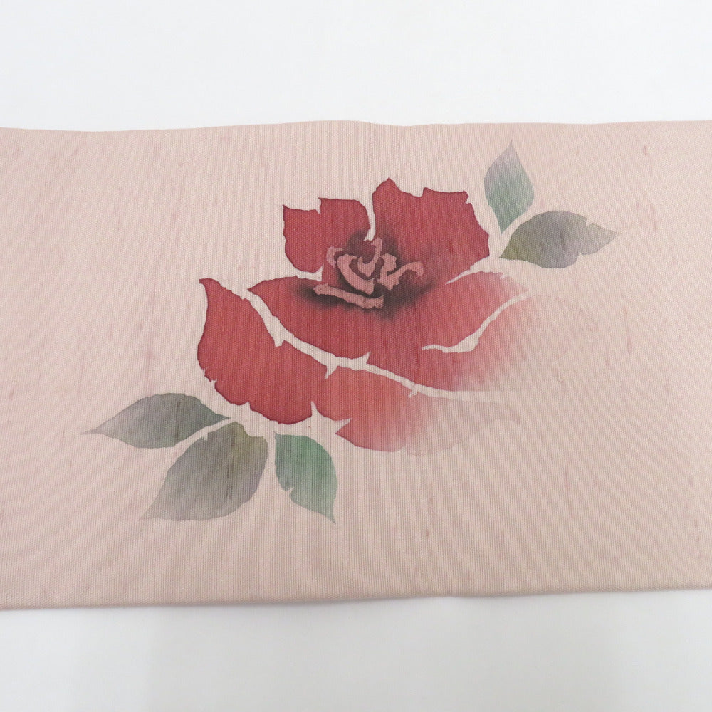 名古屋帯 正絹 紬地 薄ピンク地 薔薇柄 お太鼓柄 九寸帯 作家物 落款付