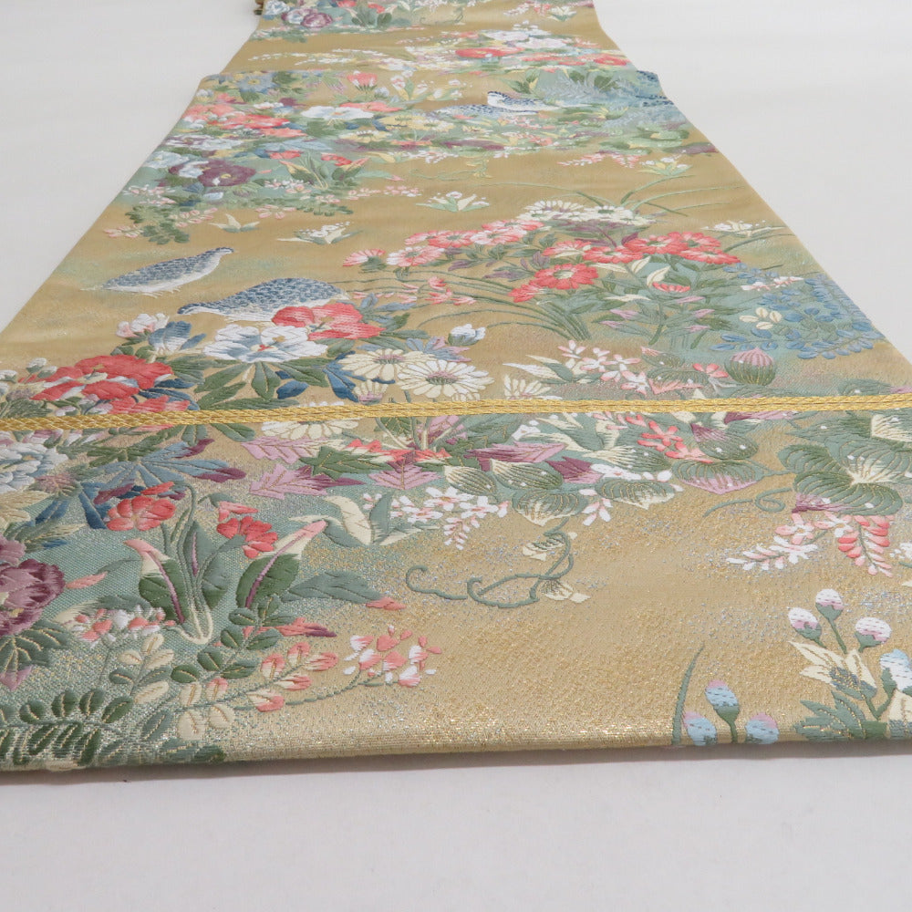 袋帯 ゴールドx緑色x多色 花々に雷鳥模様 六通柄 正絹 仕立て上がり