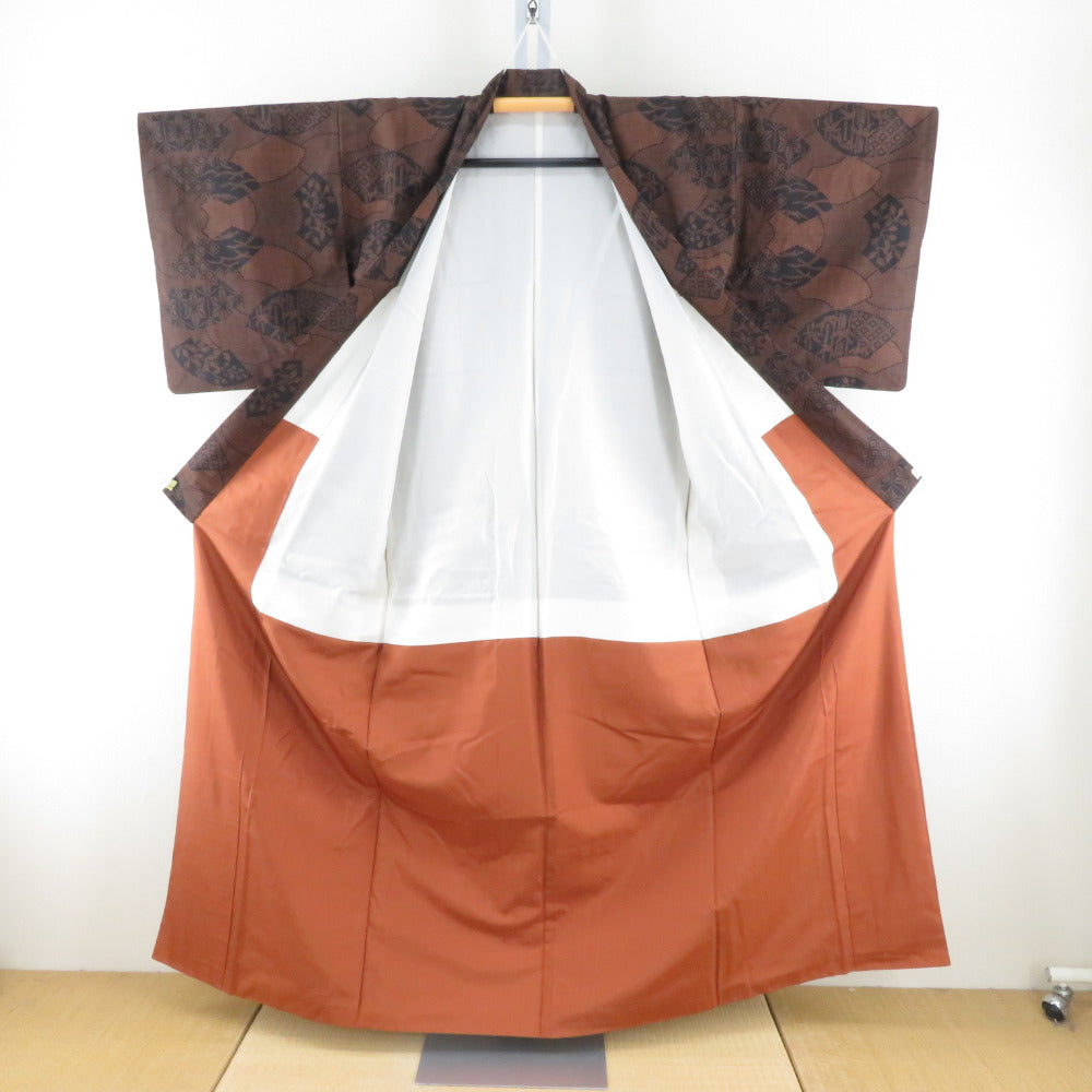 紬 着物 大島紬 扇子模様 黒色xオレンジ色 袷 バチ衿 絹 仕立て上がり