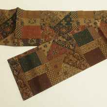 画像をギャラリービューアに読み込む, 名古屋帯 正絹 切嵌に更紗模様 全通柄 茶色ｘ黒色 ブラウン系 カジュアル 仕立て上がり 着物帯 長さ358cm