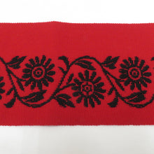 Load image into Gallery viewer, 名古屋帯 ウール 本場 筑前博多織 赤地 赤×黒 花模様 全通柄 純毛 ニッケ うーる帯 カジュアル 仕立て上がり 着物帯 長さ346.5cm