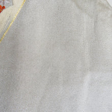 Load image into Gallery viewer, 名古屋帯 つづれ 銀色ｘ金色ｘオレンジ色ｘ多色 銀糸金糸 御所車文様 刺繍入り お太鼓柄 正絹 カジュアル 仕立て上がり 着物帯 長さ336cm