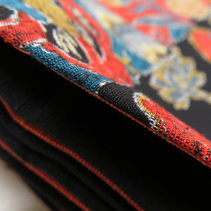 名古屋帯 ウール 一部未仕立て 更紗模様 黒色ｘ赤色 開き仕立て お太鼓柄 カジュアル 着物帯 長さ376cm 美品