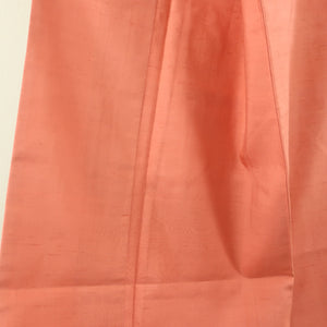 色無地 紬地 一つ紋 抱き柏紋 袷 広衿 赤橙色 正絹 仕立て上がり着物 身丈158cm 中古